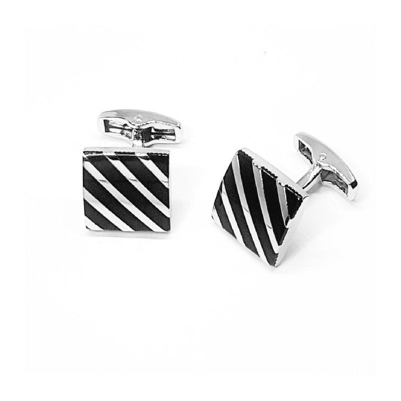 Striking Rhodium-Plated Enamel CufflinksElevate Your Look with Striking Rhodium-Plated Enamel CufflinksThese Rhodium-plated enamel cufflinks offer a bold, contemporary design with a stunning striped patterEnamel cufflinksT.M.JTheodore Men's JewelryRhodium-Plated Enamel Cufflinks