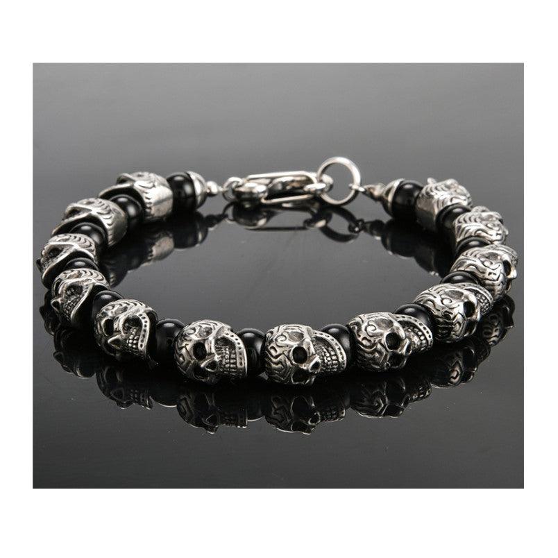 Stainless Steel Skull and Natural Stone Beads BraceletDESCRIPTION
 This stone has powerful metaphysical properties that will help to shield you against negativity. The energy of these stones may stimulate the gift of prStainless Steel BraceletsT.M.JTheodore Men's JewelryStainless Steel Skull