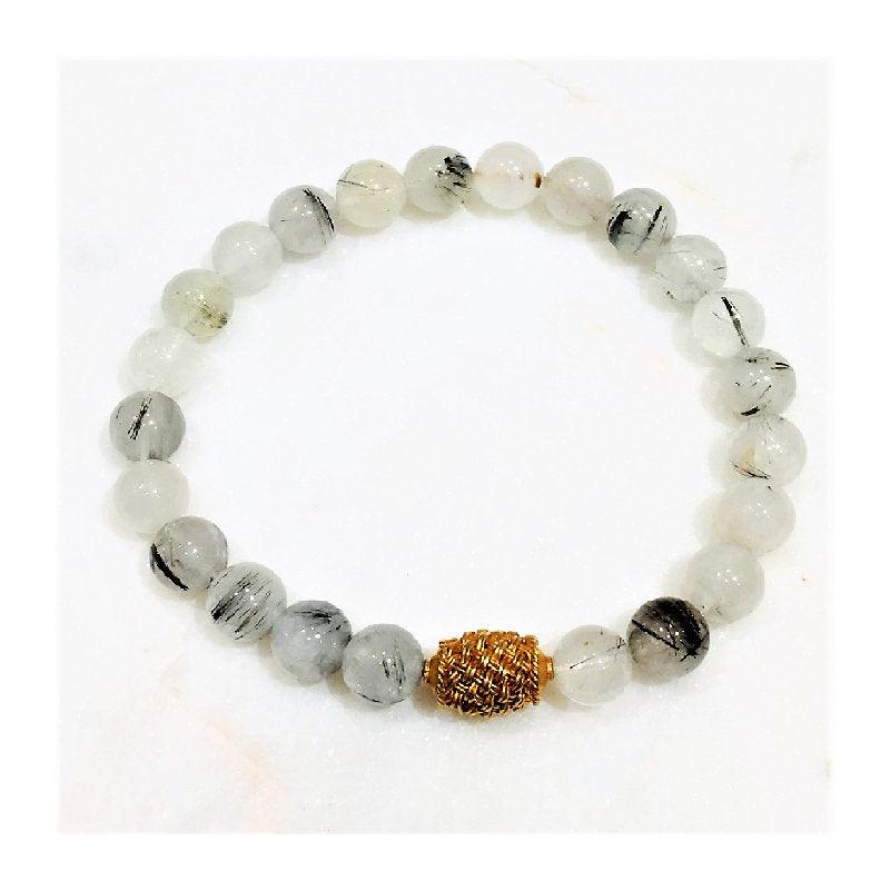 White Rutilated Quartz Beaded BraceletRutilated Quartz is an illuminator for the soul, promoting spiritual growth. It cleanses and energises the aura. Draws off negative energy and disease, letting go ofBead BraceletsT.M.JTheodore Men's JewelryWhite Rutilated Quartz
