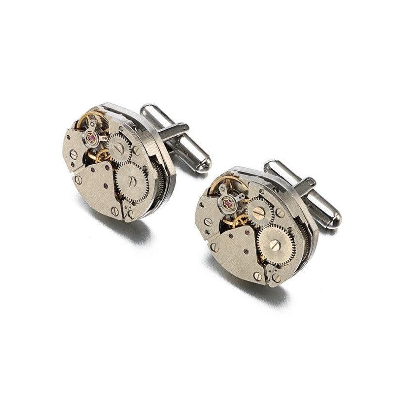 T.M.J silver vintage watch movement cufflinks featuring intricate mechanical gear design